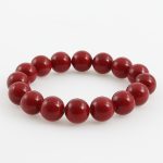 Kagyló piros golyók gumis karkötő