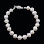 Köves ásványi ékszer. Csomózott gyöngy karkötő  zárral