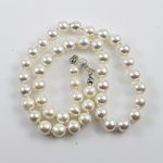 Köves ásványi ékszer Gyöngy PREMIUM AAA ÉVT 9-10mm, csodás lüszterű gyöngyökből csomózott nyl, ízléses bordásgolyó Ag zárral  49cm  49,5g