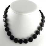 Sólyom-tigisszem korongok nyaklánc